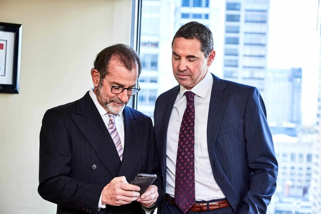 two HGSK lawyers talking two HGSK lawyers talking